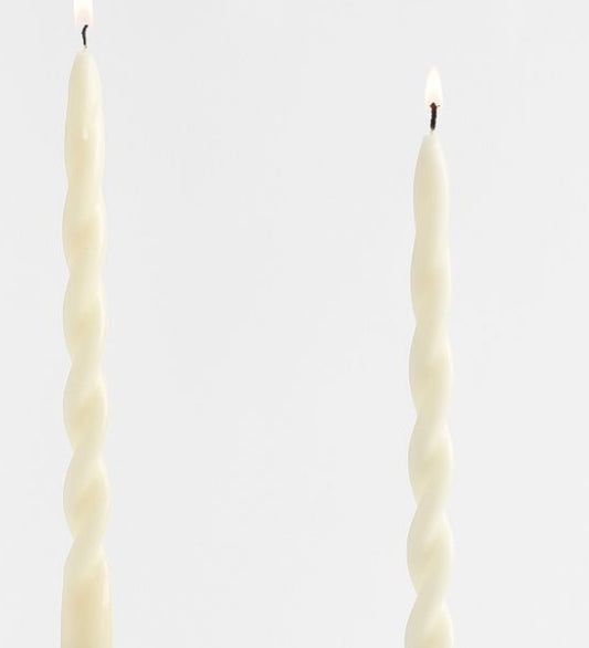 White swirly taper candle