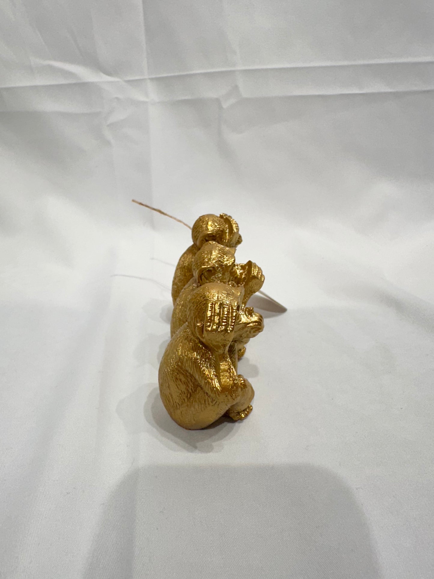 Gold monkey figurines