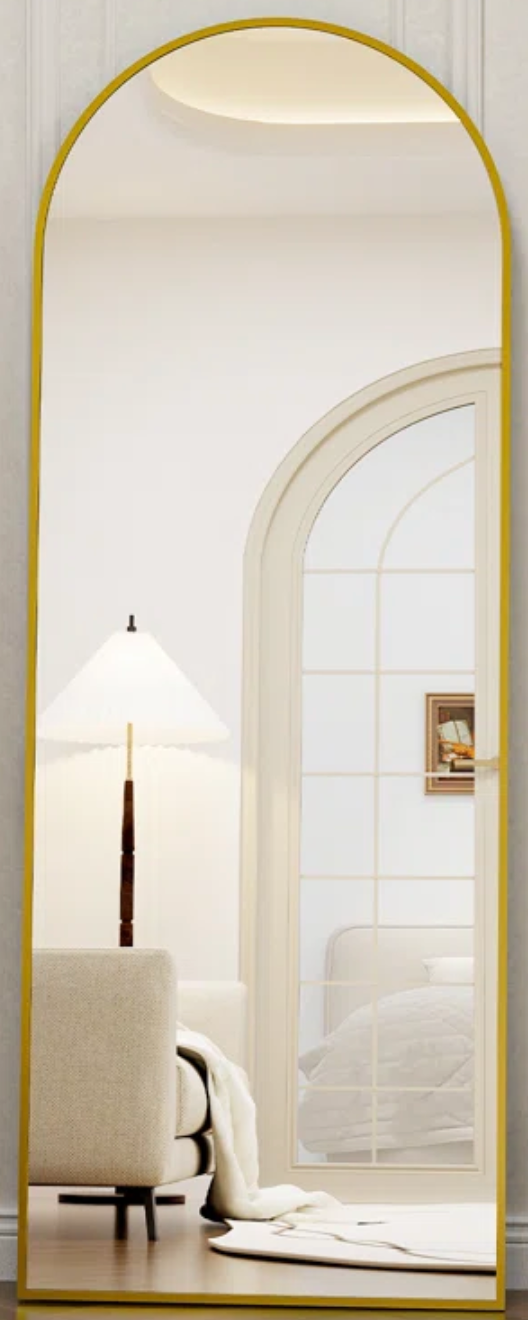 Gold arched floor mirror