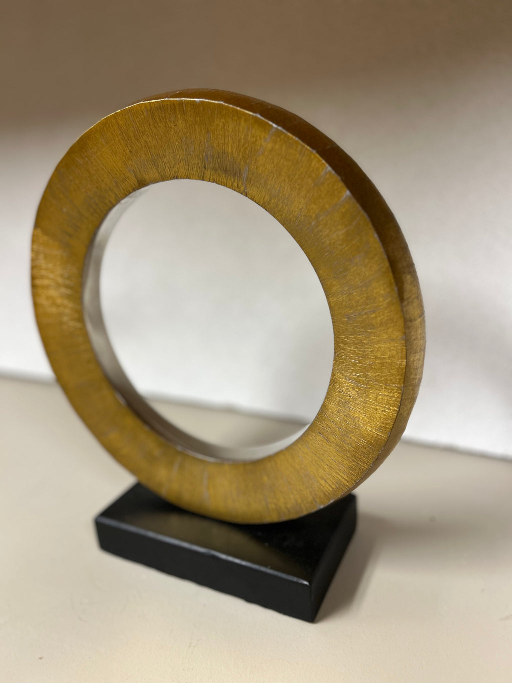 Gold Circular Statue