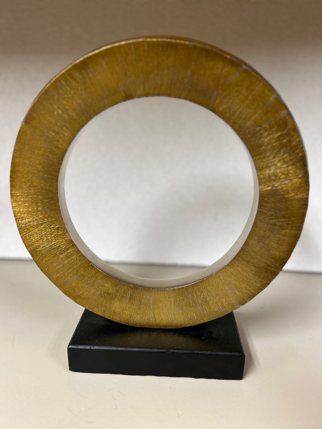 Gold Circular Statue